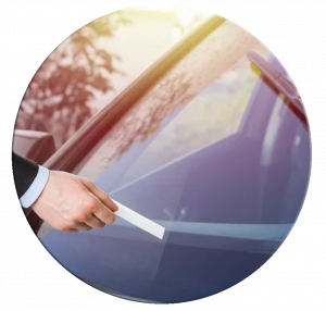 A company badge unlocking a shared vehicle